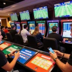 Soi keo action in a modern casino sports betting area with enthusiastic bettors analyzing odds.